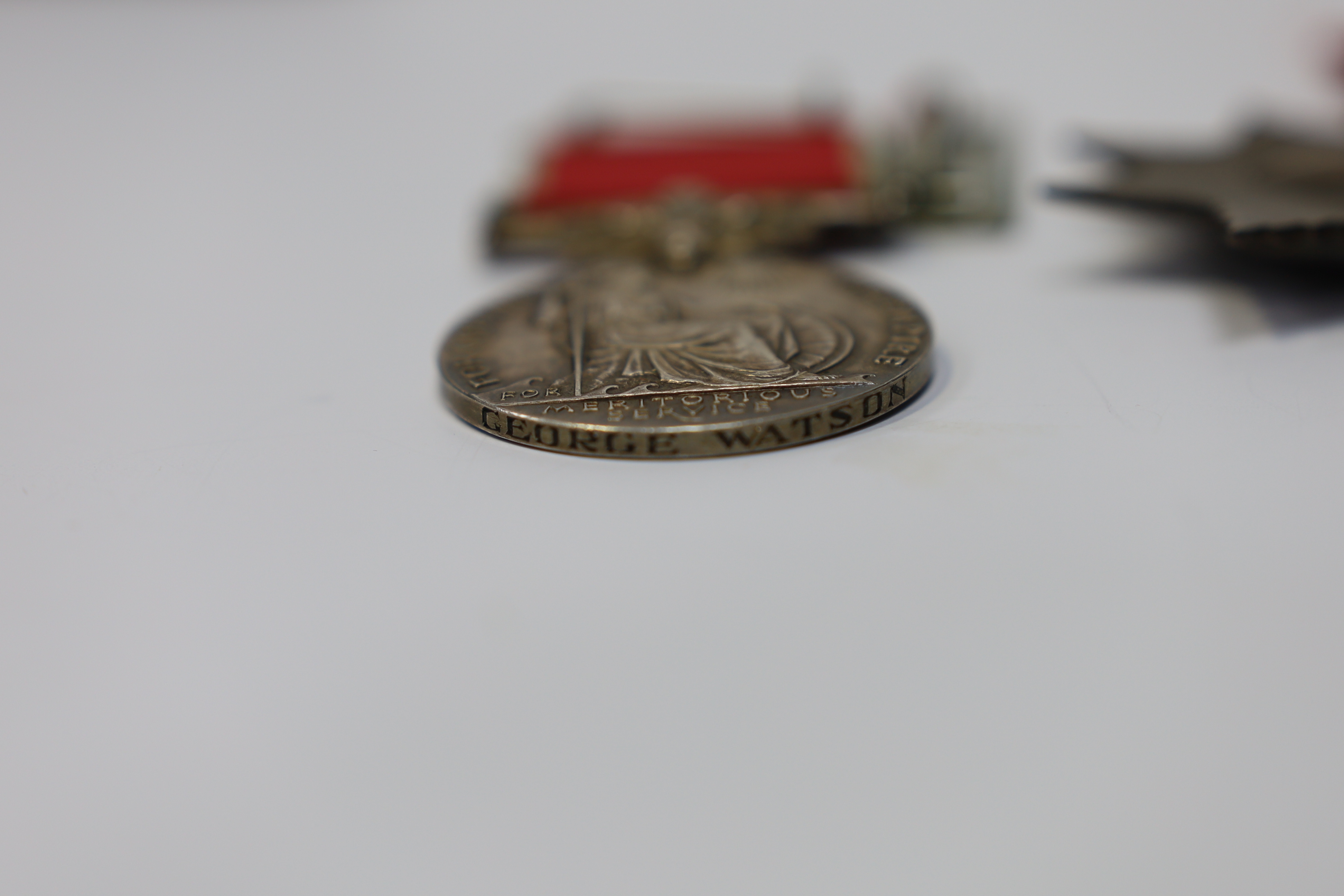 A cased George VI civil issue British Empire medal, awarded to George Watson, together with a cased George V Imperial Service Medal awarded to Richard Braid (2). Condition - fair to good